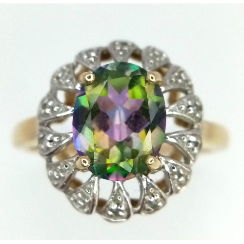 684 - 9k yellow gold diamond and mystic topaz ring, size P, 3g (dia:0.10ct/topaz:2.50ct)