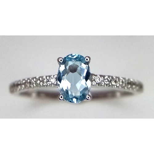 732 - 9k white gold diamond and topaz dress ring, size L, weight 1.5g (dia:0.18ct/topaz:0.57ct)