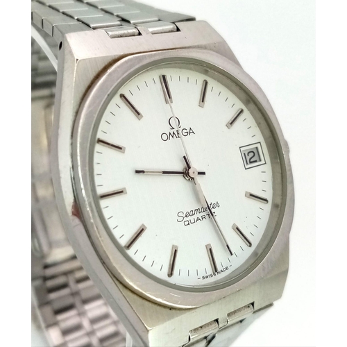 739 - A Vintage Omega Seamaster Quartz. Stainless steel strap and case - 34mm. White dial with date window... 