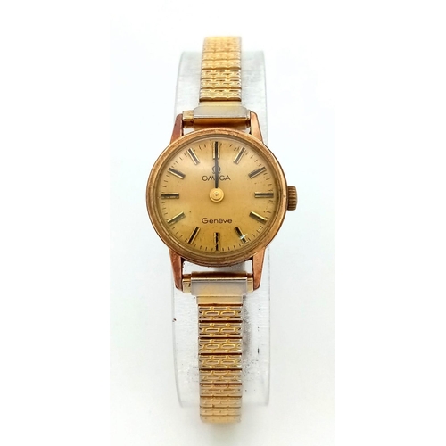 879 - A Vintage Ladies Omega Geneve. Expandable gilded bracelet.
Two tone case - 20mm. Gold tone dial. Mec... 