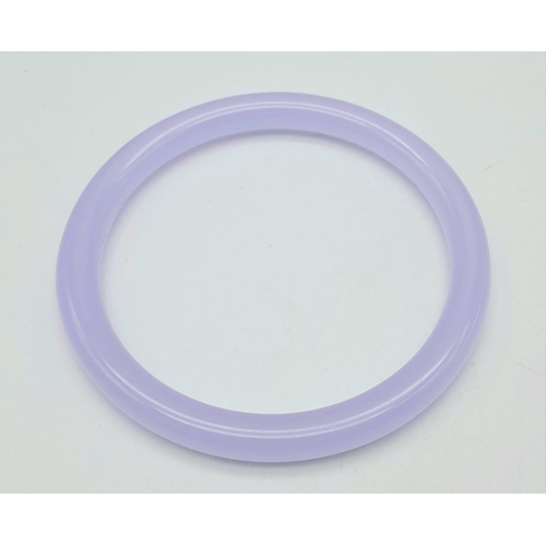 572 - A Thin Lavender Jade Bangle. 6cm inner diameter. 7mm width.