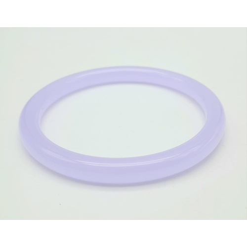 572 - A Thin Lavender Jade Bangle. 6cm inner diameter. 7mm width.