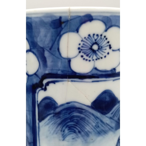 767 - A Mid 19th Century Chinese Tall Chinese Blue and White Vase. Village scenes and floral decoration. M... 