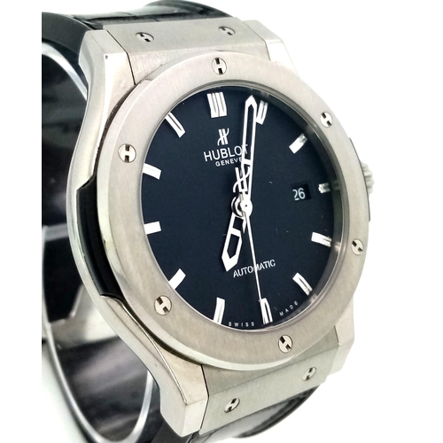 11 - HUBLOT CLASSIC FUSION AUTOMATIC WATCH, SKELETON BACK, BLACK FACE WITH DATE BOX, SILVER DIAL AND BEZE... 