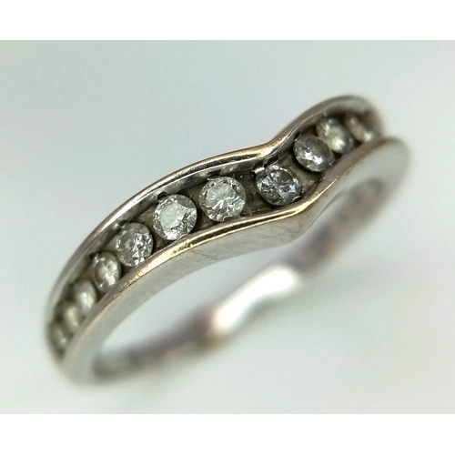 190 - 18K WHITE GOLD CURVED DIAMOND BAND RING 0.35CT 

WEIGHT: 3.4G 
SIZE O