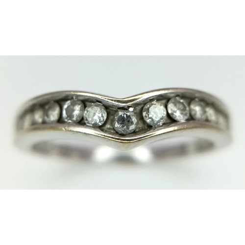 190 - 18K WHITE GOLD CURVED DIAMOND BAND RING 0.35CT 

WEIGHT: 3.4G 
SIZE O