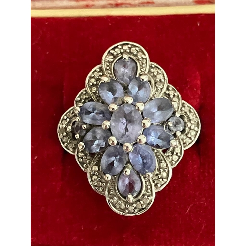 294 - Magnificent TANZANITE CLUSTER RING set in SILVER with beaded Silver surround. Presented in jewellers... 