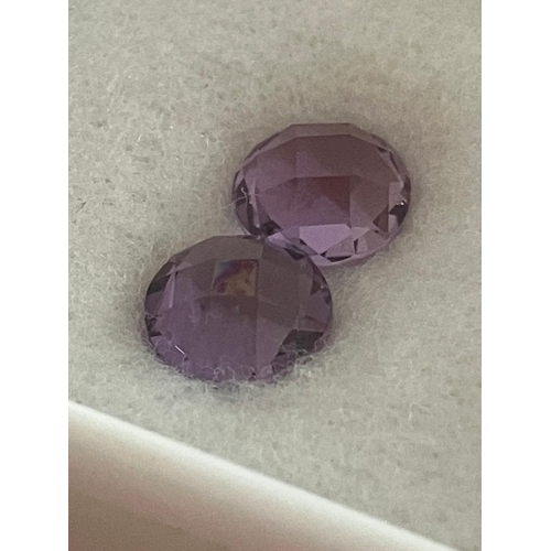 399 - 2 x AMETHYST GEMSTONES Nicely Faceted with a Royal Rose cut. Total 3.8 carat.