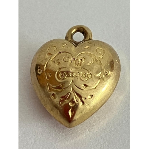 427 - 9 carat GOLD CHARM in The form of a heart with full UK hallmark. 0.4 grams.