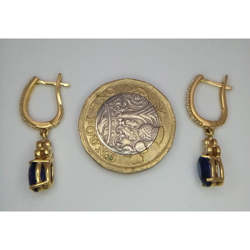 218 - 18K YELLOW GOLD WHITE & BLUE STONE DROP EARRINGS 

WEIGHT: 3.5G