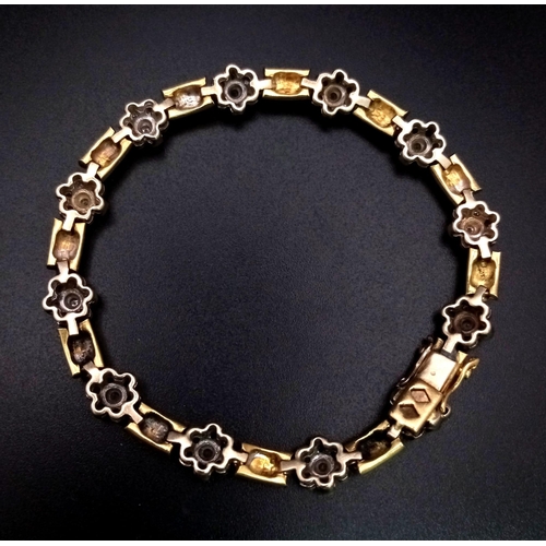 24 - A BEAUTIFUL 18K YELLOW GOLD DIAMOND SET BRACELET, WITH APPROX 0.85CT DIAMONDS FORMING FLOWER PATTERS... 