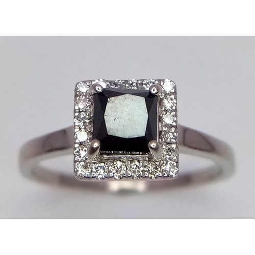 26 - A WGI certified platinum ring set with square-cut black diamond and a halo of twenty round brilliant... 