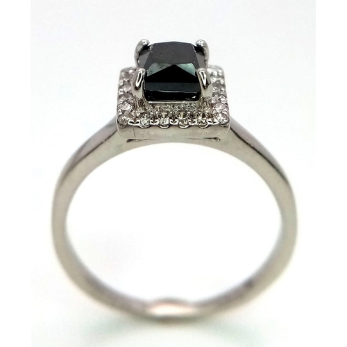 26 - A WGI certified platinum ring set with square-cut black diamond and a halo of twenty round brilliant... 