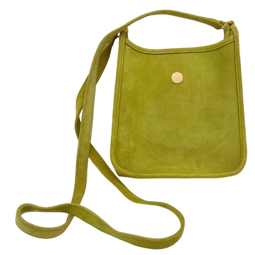 275 - A Vintage Hermes Green Suede Shoulder Bag. Olive green suede exterior with gold-tone furniture. Gree... 