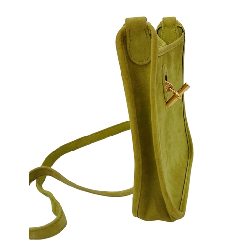 275 - A Vintage Hermes Green Suede Shoulder Bag. Olive green suede exterior with gold-tone furniture. Gree... 