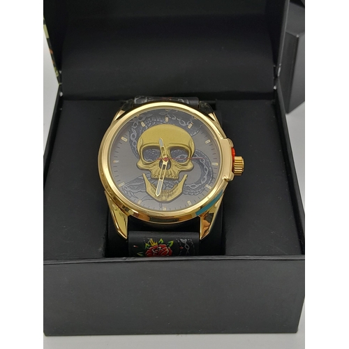 284 - Two Different Style Ed Hardy Skull Watches. As new. Both in need of a battery.