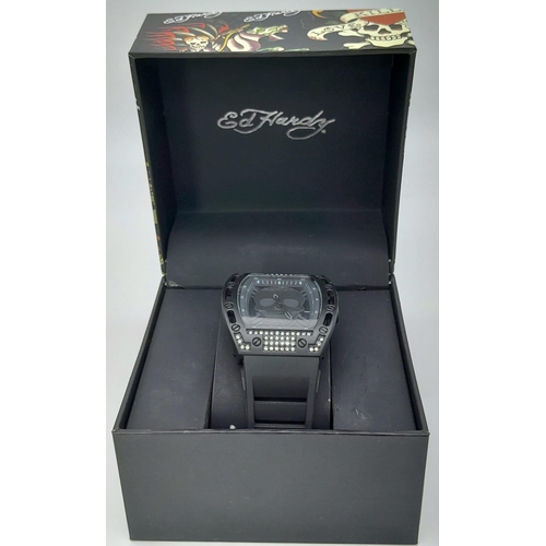 284 - Two Different Style Ed Hardy Skull Watches. As new. Both in need of a battery.