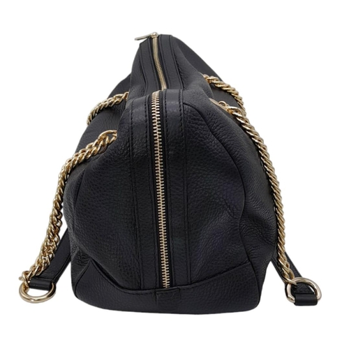 465 - A Versace Collection Black Textured Leather Handbag. Black leather exterior with gilded main zip. Go... 