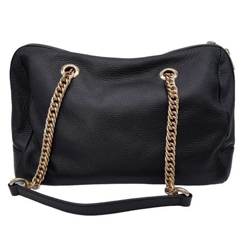 465 - A Versace Collection Black Textured Leather Handbag. Black leather exterior with gilded main zip. Go... 