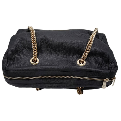 465 - A Versace Collection Black Textured Leather Handbag. Black leather exterior with gilded main zip. Go... 