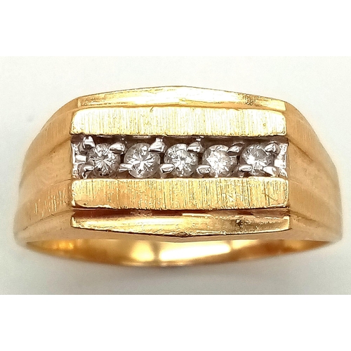 674 - A GENTS 14K GOLD RING WITH 5 DIAMONDS CHANNEL SET IN ATTRACTIVE DESIGN .   5.3gms   size Y