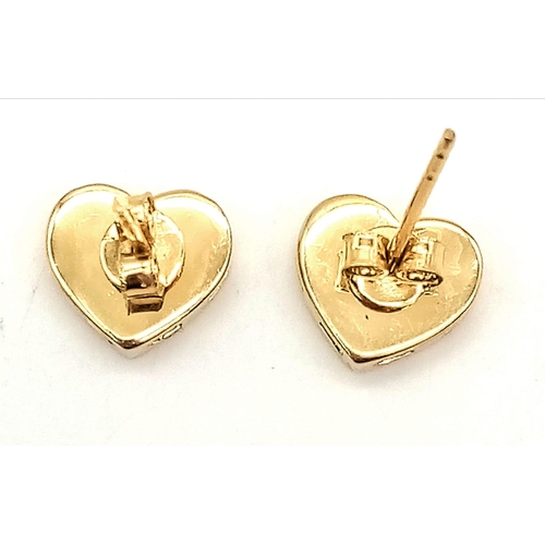 784 - PAIR OF 14K YELLOW GOLD GUESS STYLE STUD EARRINGS 2.1G