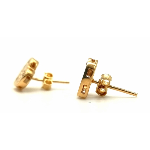 784 - PAIR OF 14K YELLOW GOLD GUESS STYLE STUD EARRINGS 2.1G