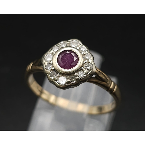 124 - A Vintage 9K Yellow Gold Ruby and Diamond Ring. Central ruby with a halo of diamonds. Size N. 2.25g ... 