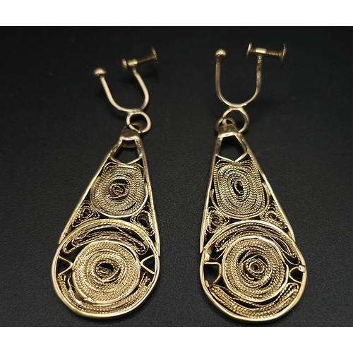 150 - A Pair of Vintage 9K Yellow Gold Artistic Filigree and Pierced Decorative Drop Earrings. Screw clasp... 