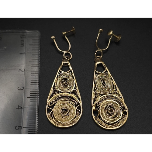 150 - A Pair of Vintage 9K Yellow Gold Artistic Filigree and Pierced Decorative Drop Earrings. Screw clasp... 