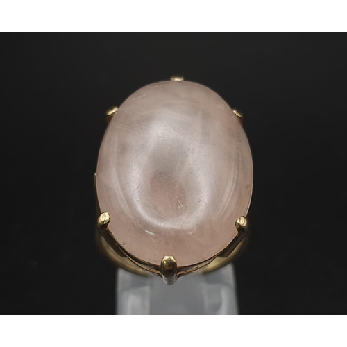 158 - A Vintage 9K Yellow Gold Rose Quartz Ring. Large rose quartz cabochon. Size M. 8g total weight.