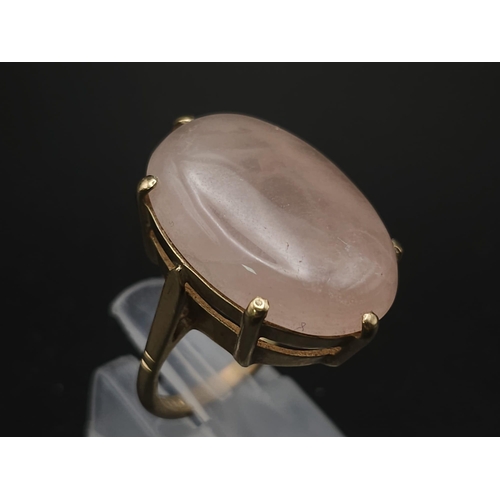 158 - A Vintage 9K Yellow Gold Rose Quartz Ring. Large rose quartz cabochon. Size M. 8g total weight.