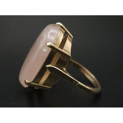 158 - A Vintage 9K Yellow Gold Rose Quartz Ring. Large rose quartz cabochon. Size M. 8g total weight.