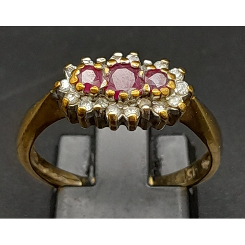 165 - A Vintage 9K Yellow Gold Garnet and Diamond Ring. Three garnets surrounded with a halo of diamonds. ... 