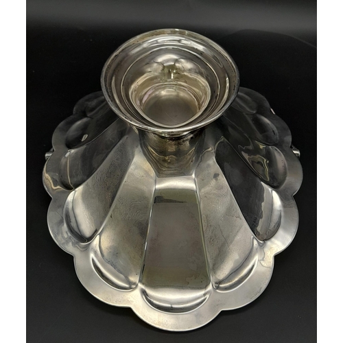 25 - A SOLID SILVER FRUIT DISH WITH HANDLE DATED 1912 AND MADE IN SHEFFIELD , NICE CONDITION FOR AGE .   ... 