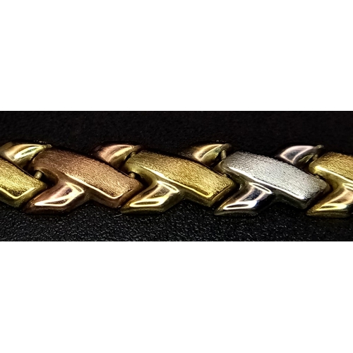 255 - A 9K Tri-Colour Gold Crossover Bracelet. 18cm. 3.84g weight