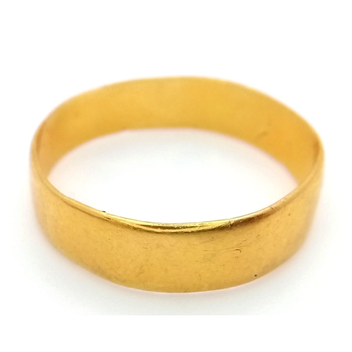 276 - A Vintage 22K Yellow Gold Band Ring. Full UK hallmarks. Size O/P. 2.9g weight.