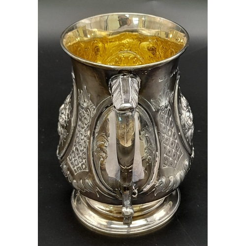 33 - AN EARLY VICTORIAN SILVER TANKARD MADE BY ADEY B SAVORY IN LONDON WITH INCREDIBLE HAND CHASED REPOUS... 