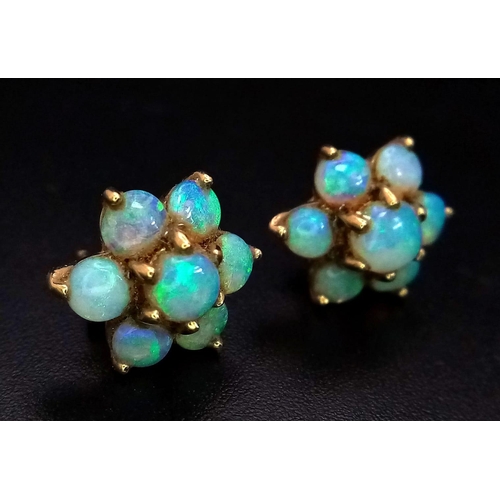 374 - 9K YELLOW GOLD OPAL STUD EARRINGS 

WEIGHT: 2.1G