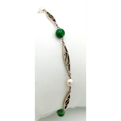 548 - A DELICATE 9K WHITE GOLD GREEN & WHITE STONE SET BRACELET, WEIGHT 3G AND 18CM LONG APPROX, STONES  B... 