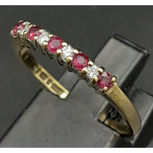 700 - 9K YELLOW GOLD DIAMOND & RUBY BAND RING 

WEIGHT: 1.5G 
SIZE O