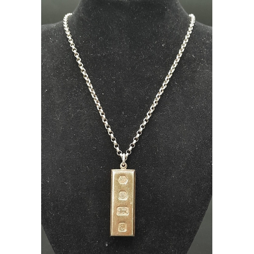 816 - A SOLID SILVER INGOT PENDANT ON A 54cms SILVER BELCHER CHAIN .   42gms