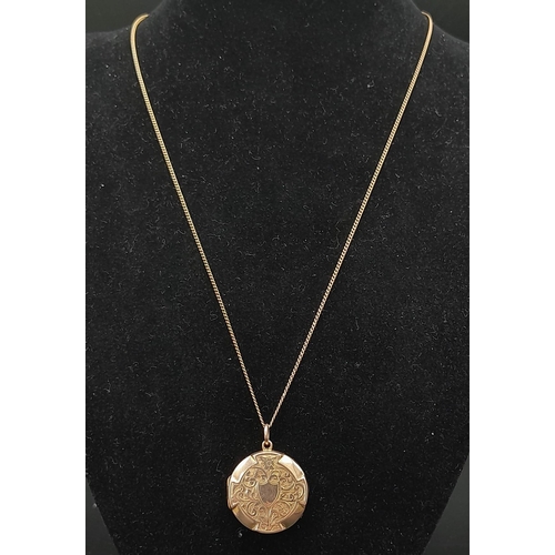 220 - An Antique 9K Yellow Gold Locket (still contains stoic-looking pictures of husband and wife) on a 9K... 