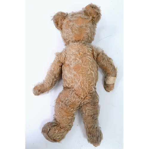 423 - A Vintage Merrythought Teddy Bear. 60cm.