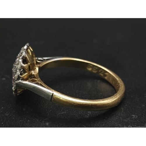 745 - A Vintage 18K Yellow Gold and Platinum Diamond Ring. An array of diamonds in a platinum setting. Siz... 