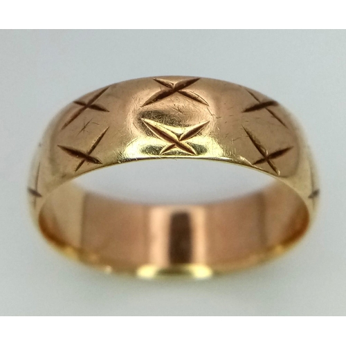 982 - A 9K GOLD BAND RING WITH THE 