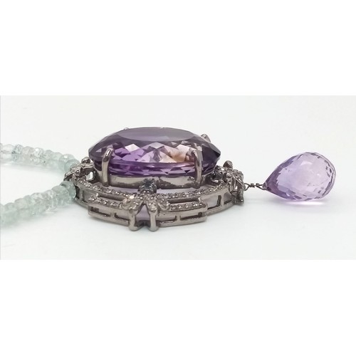 122 - A Stunning 49ct Amethyst Gemstone Drop Pendant with an intricate 1.5ctw Diamond halo - It comes with... 