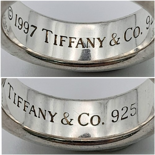 282 - A Tiffany and Co. Silver Ring. Size L/M. Original Tiffany packaging.