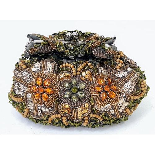 458 - A Vintage Ornate Beaded Handbag. 22cm x 15cm.