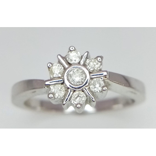 770 - A MORDERN FLORAL DESIGNED 9K WHITE GOLD DIAMOND RING, WITH APPROX 0.12CT DIAMONDS, WEIGHT 3.5G SIZE ... 